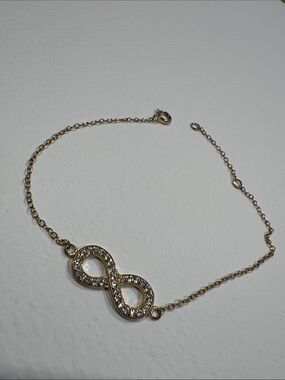 Gold-Tone Sterling Silver Infinity Pendant Bracelet with Crystal Accents